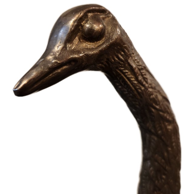 Sarreid MCM ostrich figurine made of brass and wood. Ostrich body is an egg-shoped piece of wood with bronze legs, tail...