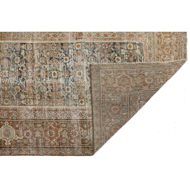 Elevate your space with the timeless elegance of this authentic Antique Mahal Rug, expertly hand-knotted from high-grade...