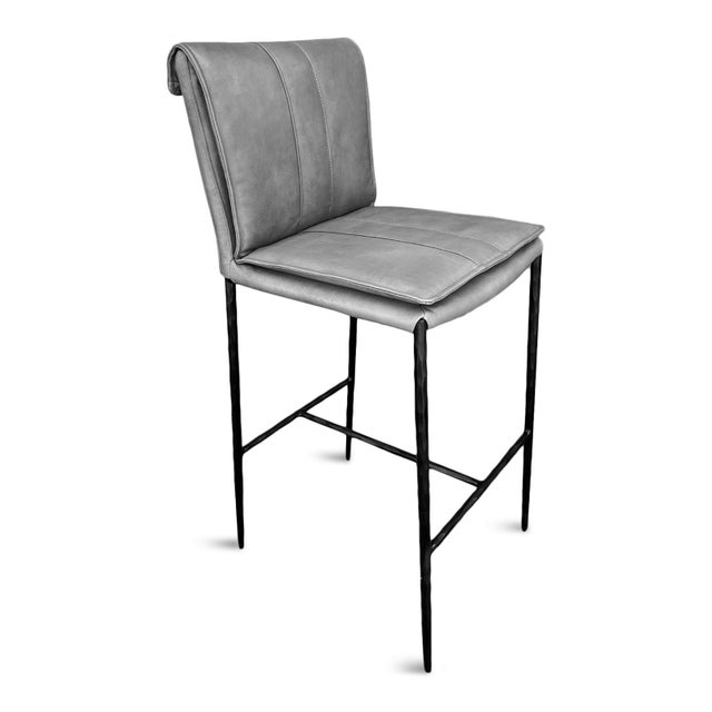 Beautiful top grain dusk grey leather bar stool. Solid and sturdy black iron frame and legs with double seat cushion and...