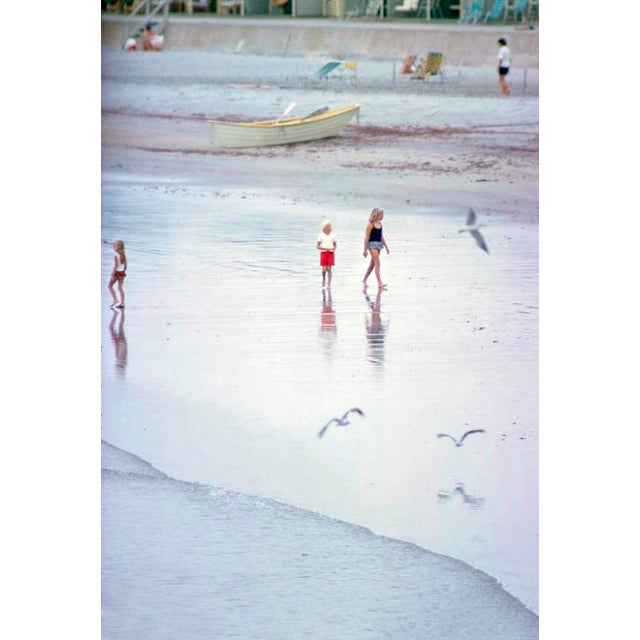 Newport Scenes by Toni Frissell Children wander on the beach at Newport Rhode Island, USA, 1962. (Photo by Toni Frissell)...
