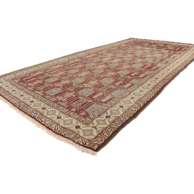 Distressed Antique Persian Azerbaijan Gallery Rug 4'10 x 09'08. With its time-softened colors and rugged beauty, this...