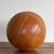 Vintage leather medicine ball from the UK. Beautiful warm leather shows rich patina. This is the largest of the available...