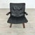 Dimensions: H 30” x W 27.5” x SD 19.5” x SH 16.5 Vintage Kengu-Armchair in black leather and bentwood, designed by Elsa &...