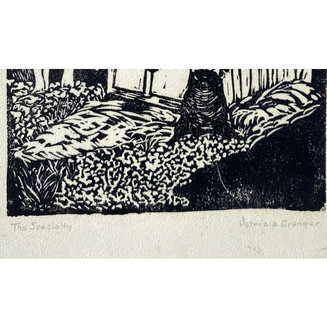 1970s Patricia Grainger "The Specialty" linocut on rice paper laid onto a mount. Pencil signed and titled.
