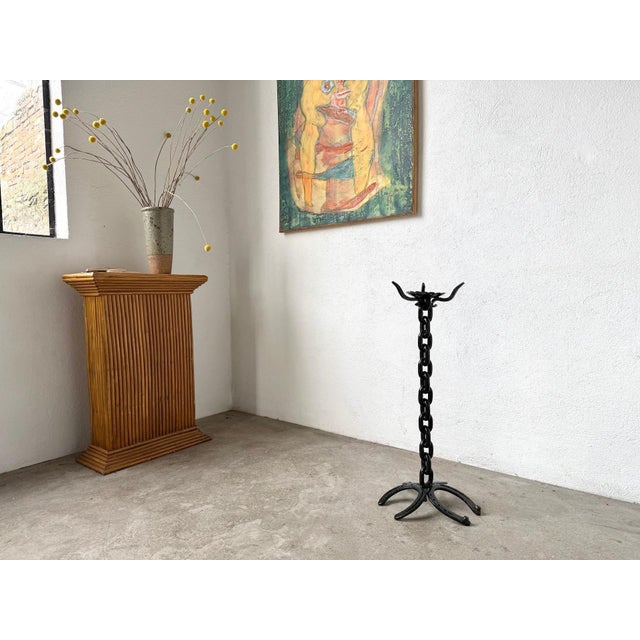 Maison Lecan presents this large wrought iron floor candlestick, a piece of French folk art dating from around 1900. The...