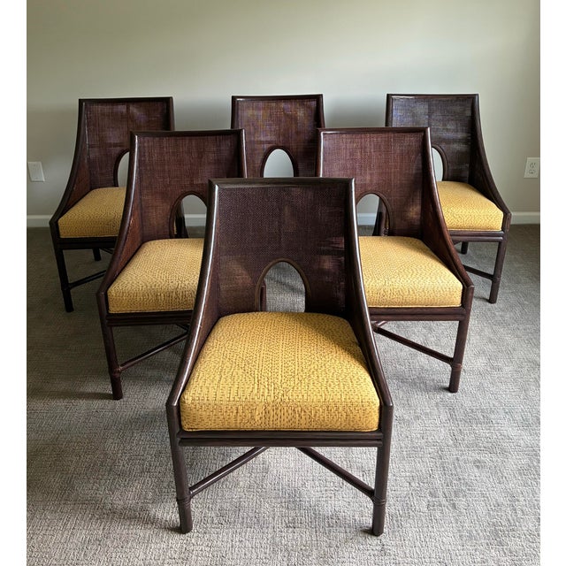 An exceptional and highly sought-after set of six Barbara Barry for McGuire San Francisco dining chairs showcasing the...