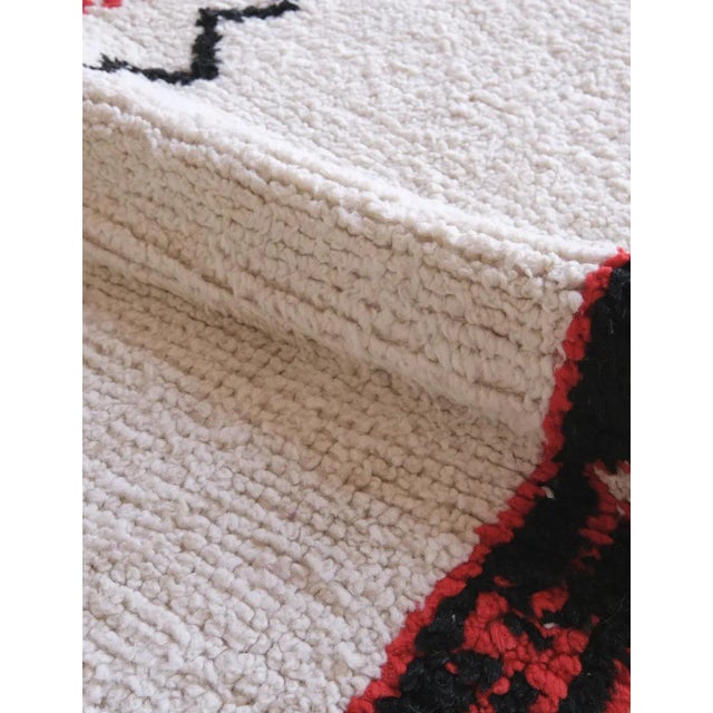 Boujad rugs are handwoven pile rugs from a small region in Haouz between the Middle Atlas and the Atlantic ocean. The...