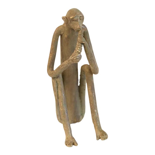 Vintage African Sitting Monkey Eating Sculpture For Sale