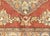 Expertly handwoven in the Oushak region of Western Turkey, this Vintage Turkish Oushak Rug features a traditional design...