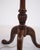 Floor lamp with integrated lamp table made in mahogany in the style of late Empire from the 1880s. The lamp features a...