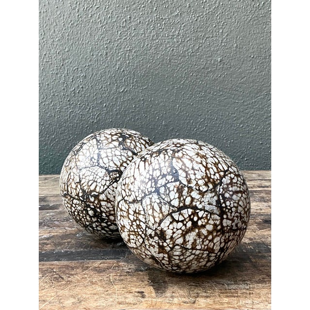 These striking decorative spheres are a sophisticated nod to the luxurious textures of the Art Deco and Mid-Century Modern...