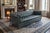 This classic English Traditional design. Upholstered in distressed olive green leather with a rich vintage patina, the...