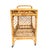 Charming vintage rattan bar cart featuring a beautifully woven frame with decorative fiddle leaf–style scroll detailing...