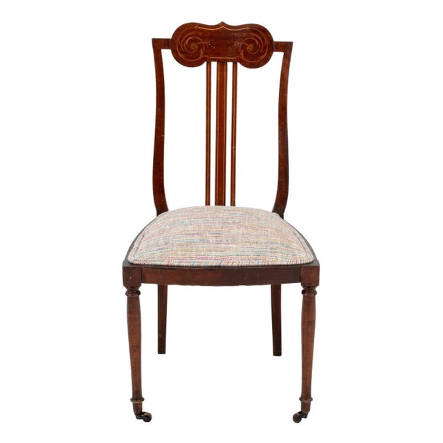 American Marquetry Walnut Side Chair, circa 1890, the back with scrolling inlay, the two front legs on casters. 35.5" H x...