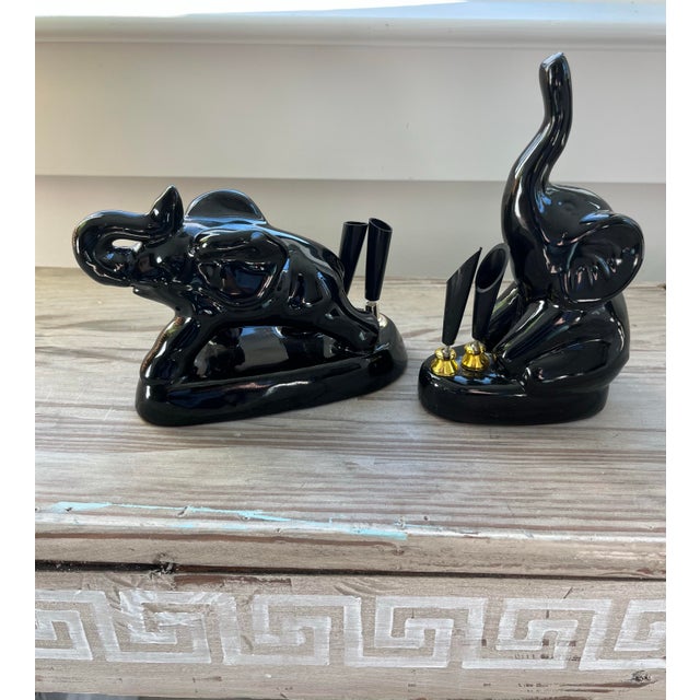 Trunks up for luck! Perfect vintage mid-century pieces to hold your gold, black, and silver pens. Pens not included....