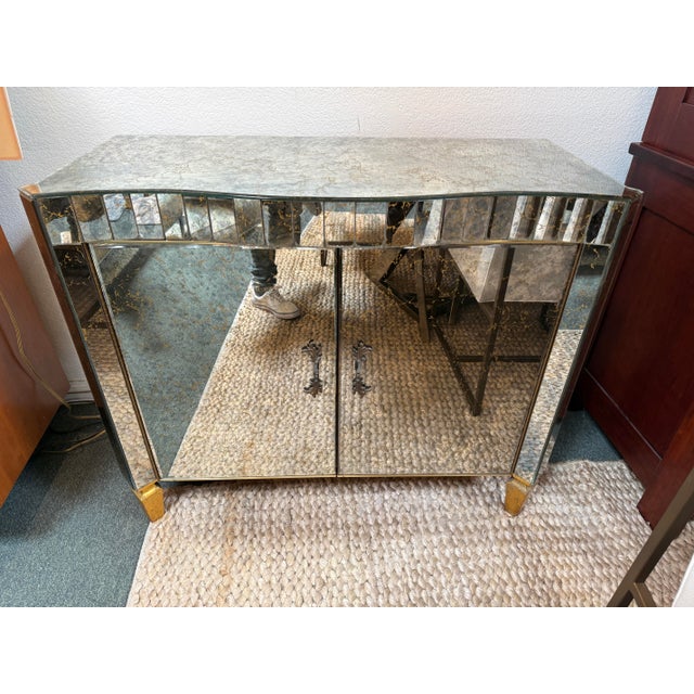 Design Plus Gallery presents an Art Deco Cabinet from the 1940's with Glass Gilding or Verre Églomisé. The cabinet is...