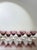A set of seven vintage French wine glasses, each with a delicate purple twist rising through clear glass. Compact at 3.25"...