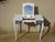 A 1970s dressing table in solid wood, restored and painted white. The central section opens to reveal a mirror on a...