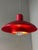 This Horn 728 pendant lamp is a striking piece of lighting from Denmark, distinguished by its vibrant red color and...