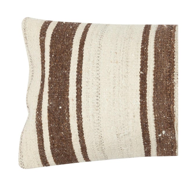 Add a touch of history and warmth to your space with this vintage handmade Turkish hemp kilim cushion cover. Crafted from...