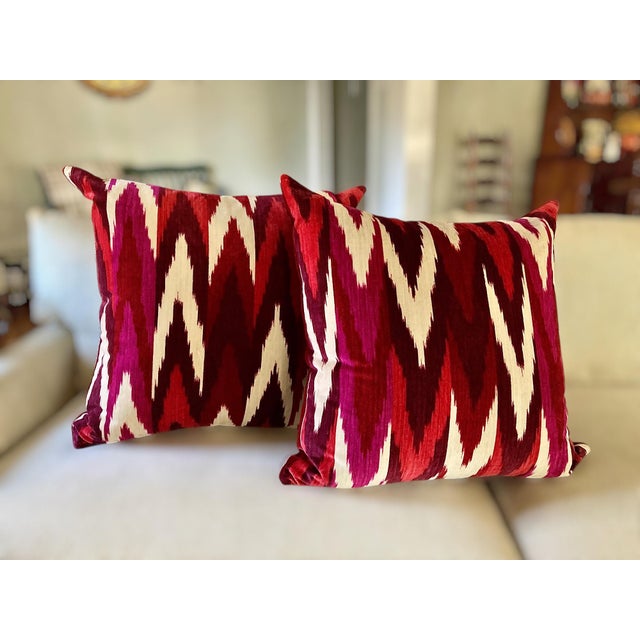 Rich ruby and plum zigzag ikat on Italian cotton velvet brings bold geometric energy to this pair of custom 22-inch...