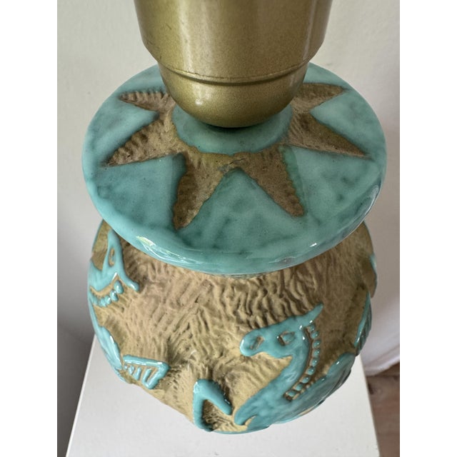Charming table lamp with matt rough body and shine turquise glazed sgrafitto Horse relief. Made by Saca pottery, Italy in...