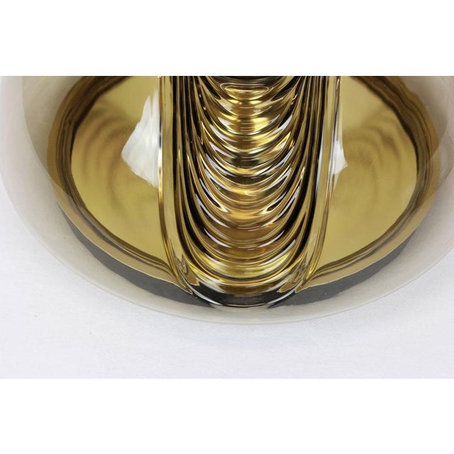 A special round biomorphic smoked glass wall sconce or flush mount designed by koch & lowy for peill & putzler,...