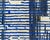 Bands of cobalt blue trickle down like rain across a charcoal and ivory field. This hand-knotted wool rug builds its...