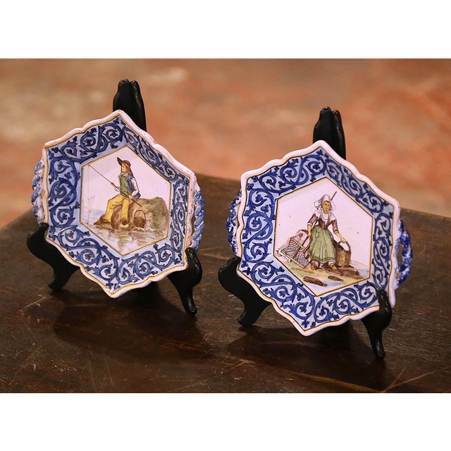 Decorate a coffee table or a shelf with this elegant pair of antique plates. Created in Brittany, France circa 1910, and...