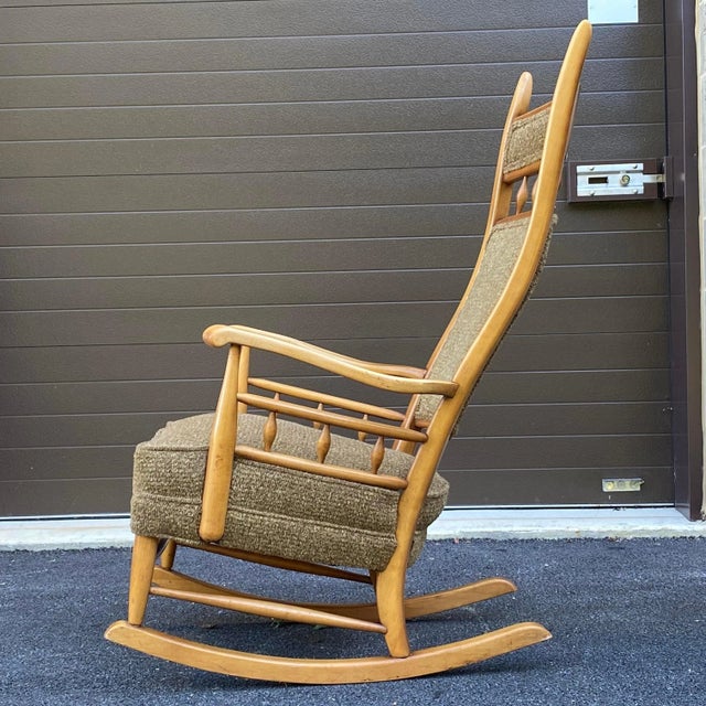 A rare rocking version of the high back sculptural chair often attributed to Edward Wormley.
