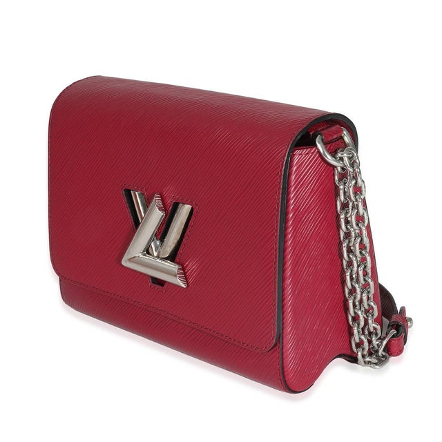 The Louis Vuitton Twist collection was unveiled in 2015. The accessory features a chunky monogram logo on the front for a...