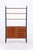 Vintage teak shelving unit with generous open shelves and integrated storage. The lower section combines a door with five...