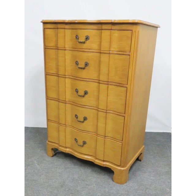 Chippendale style chest of drawers , faux painted finish , serpentine front , bracket feet , brass hardware . Made by John...