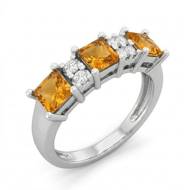 This striking ring showcases a vibrant combination of Citrine gemstones paired with brilliant white accent stones,...