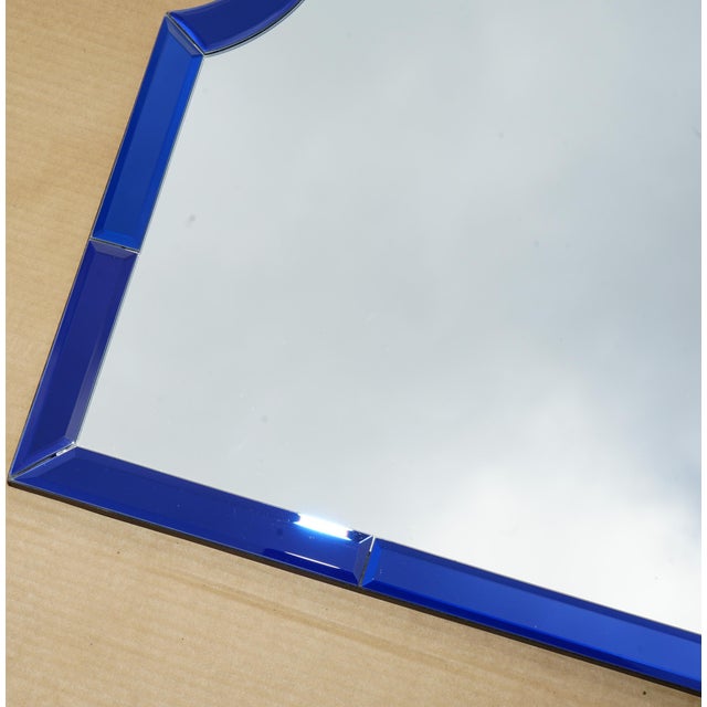 Stunning vintage Cobalt Blue Mid Century Modern style Bevell edged wall mirror. A very good looking well made and...