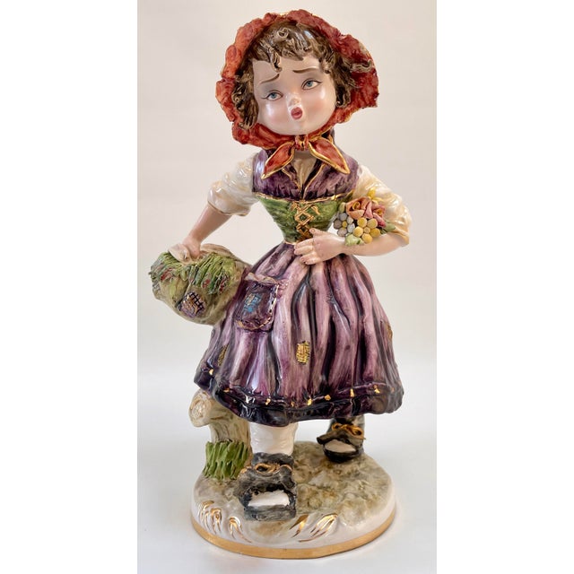 Large Italian Capodimonte hand-made and hand painted girl figurine beautifully decorated in regal colors of purple, green,...