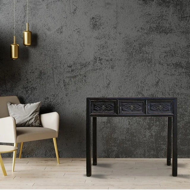 Featuring 3 nicely hand carved drawer fronts, this pretty antique table is constructed traditional tenon and mortise...