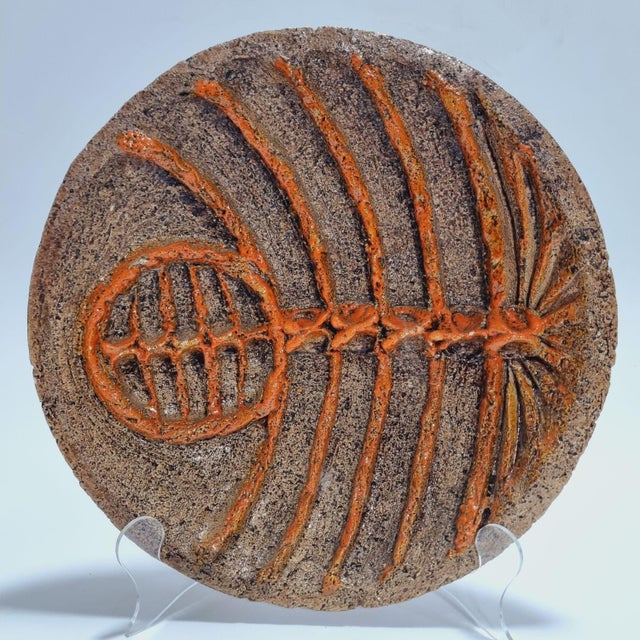 Handmade ceramic wall decoration by ceramist Zsuzsa Györgyey. Brutalist ceramics with a rough surface typical of the...