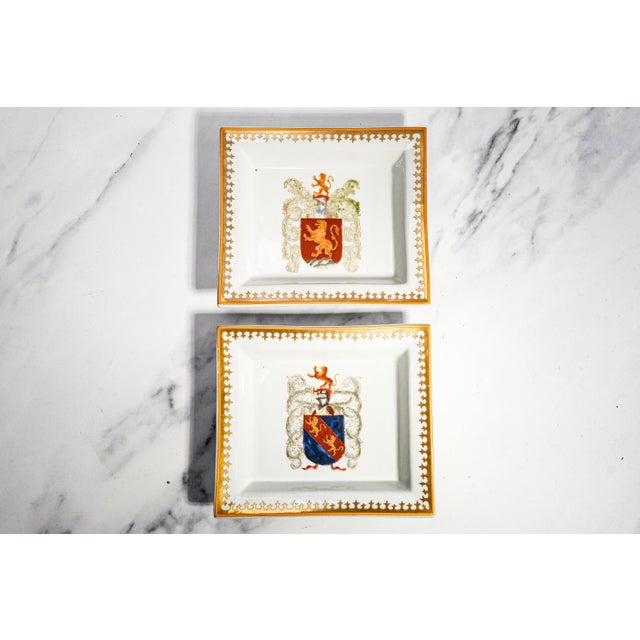 A handsome pair of vintage porcelain catchall trays, these elegant dishes bring together classic old-world style, colorful...
