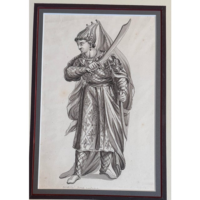 An evocative original theatrical costume sketch by John Burnet of London, depicting a dramatically dressed figure in an...