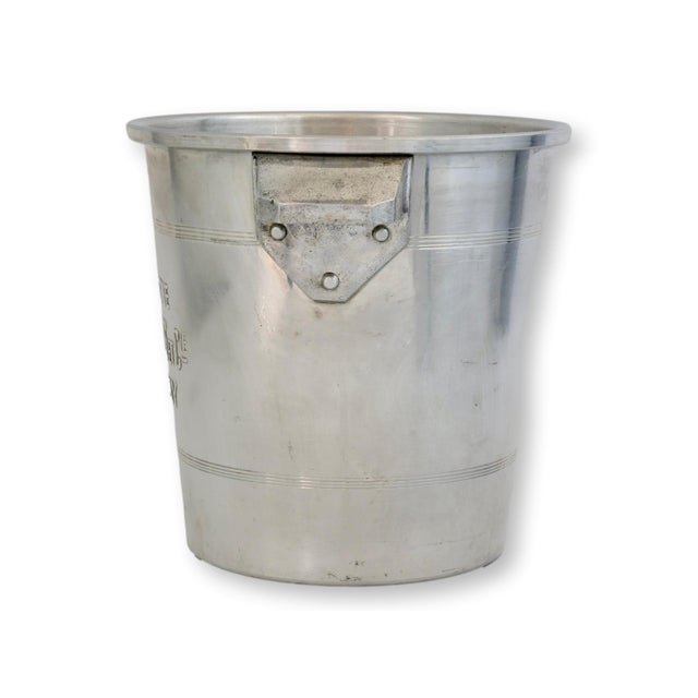 Champagne A. Desmoulins et Cie, Epernay. Featuring a classic tapered cylindrical form with rolled rim and angular side...