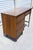 A Mid Century Modern walnut writing desk, attributed to Stanley Furniture Co, featuring clean lines and timeless design....