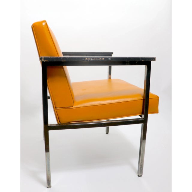 High quality period steel frame arm chair in the style of the iconic Nelson for Herman Miller Paddle arm chair. This...
