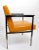 High quality period steel frame arm chair in the style of the iconic Nelson for Herman Miller Paddle arm chair. This...