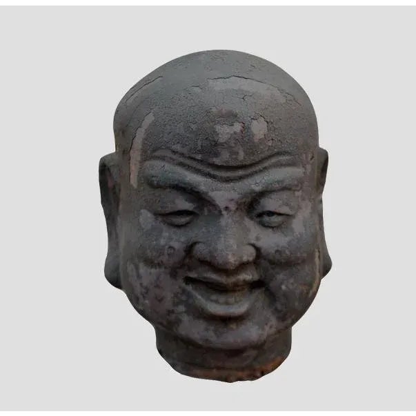 This Luohan head from 1886 was hand made of clay. There is some minor peeling. But overall it is in great condition....