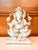 A finely carved marble statue of Ganesh circa 19th century from India. The semi-elephant semi-human Hindu deity is also...