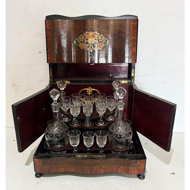 A very fine napoleon iii liquor cabinet. box veneered in thuya burl and black wood. Mahogany interior. two rosewood and...