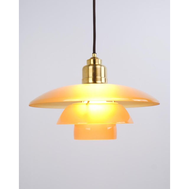 Ph 3½-3 pendant designed by poul henningsen and released as a limited edition in 2017 by louis poulsen. The lamp features...