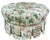 A beautifully upholstered vintage Hickory Chair round ottoman featuring deep tufting, tailored skirted sides, and a...