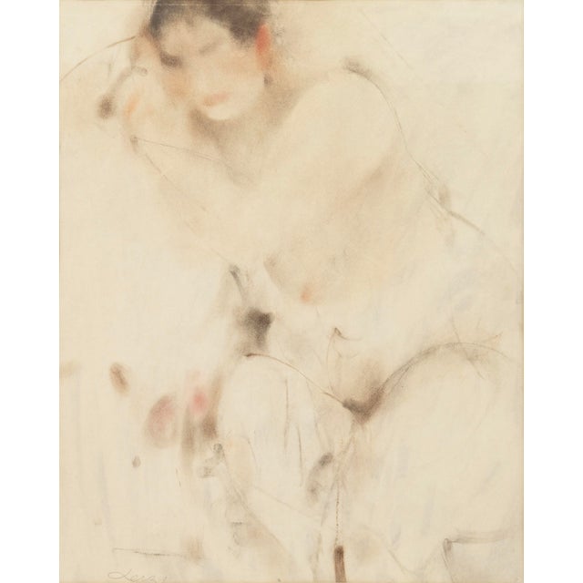 A delicate and atmospheric watercolor by Richard Jerzy depicting a seated female nude rendered with remarkable restraint...